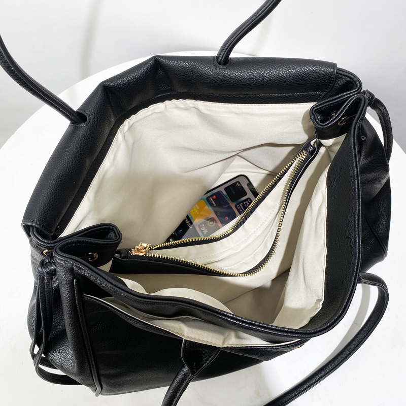 Maletín clásico Bolsas de asas - Luxury Bags Trend 2025 reseña y precio